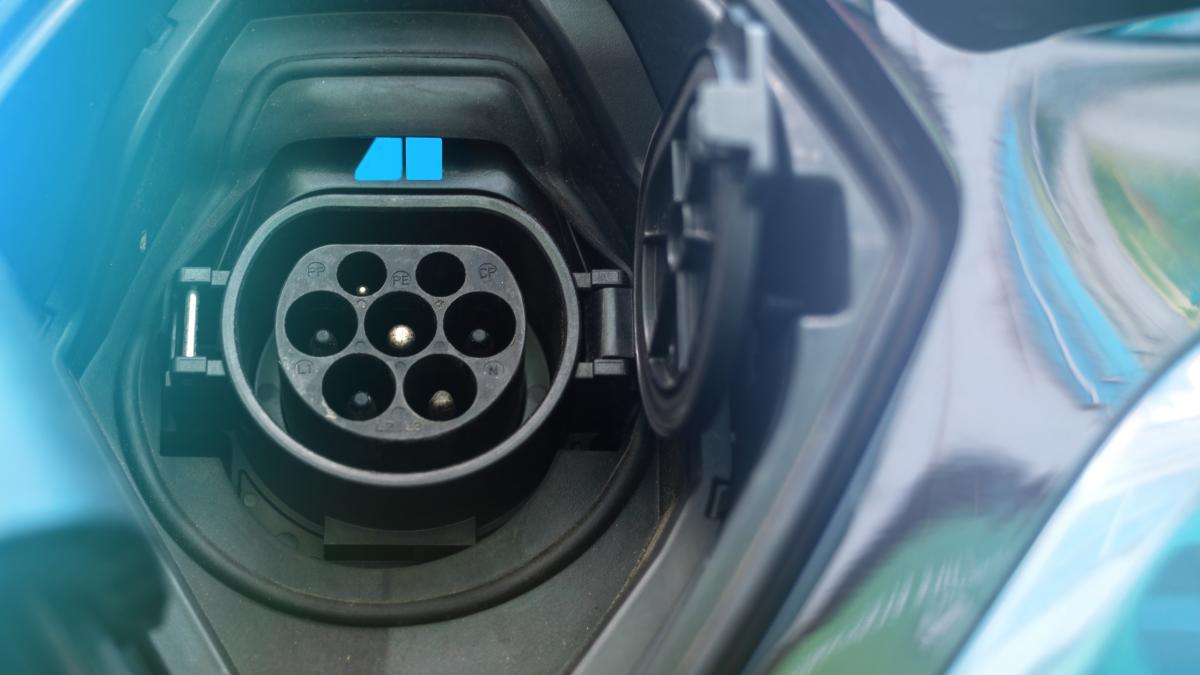 charging-socket-electric-car-with-blue-light_86817900