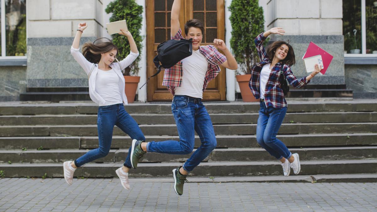 cheerful-students-jumping-excitement_57154100