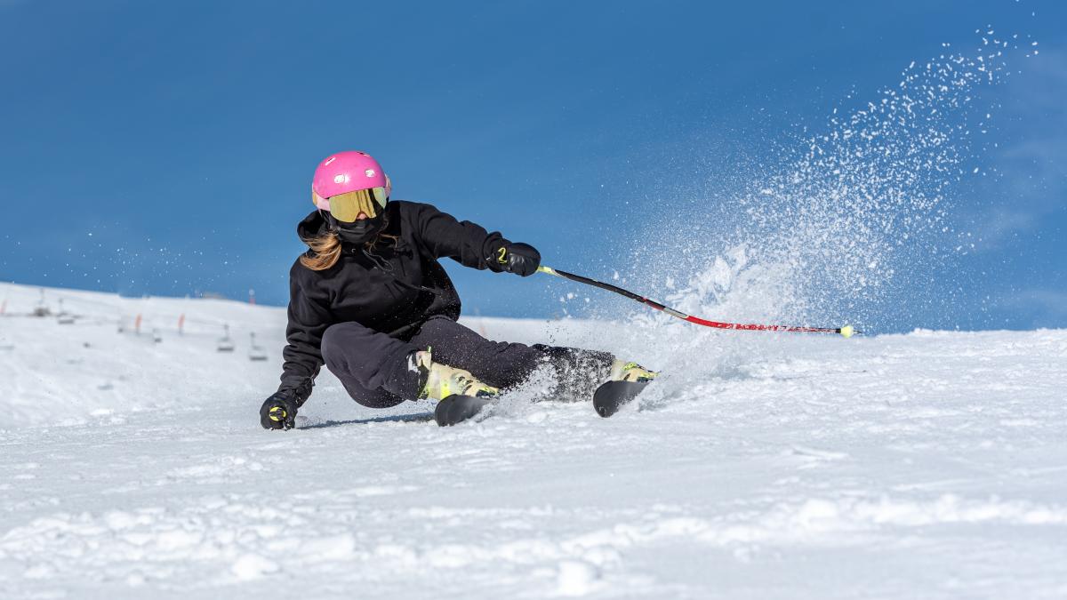 young-blonde-woman-skiing-sunny-day_69926000