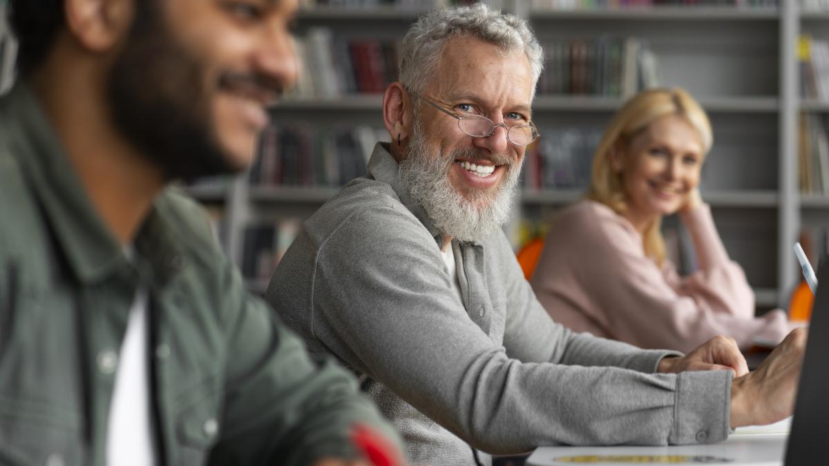 medium-shot-adults-studying-together_62263600