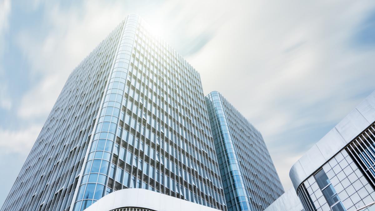 giant-building-with-sun_67998600