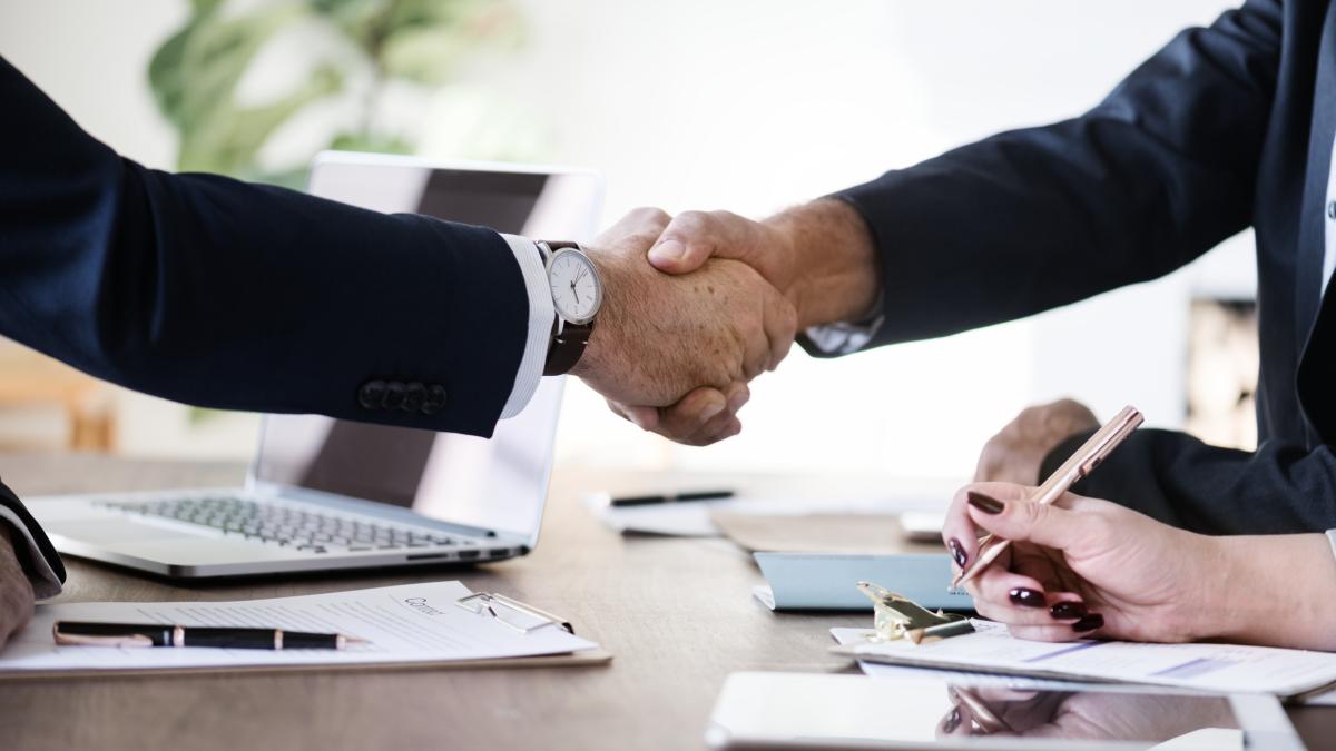 business-people-shaking-hands-together-1_83519300