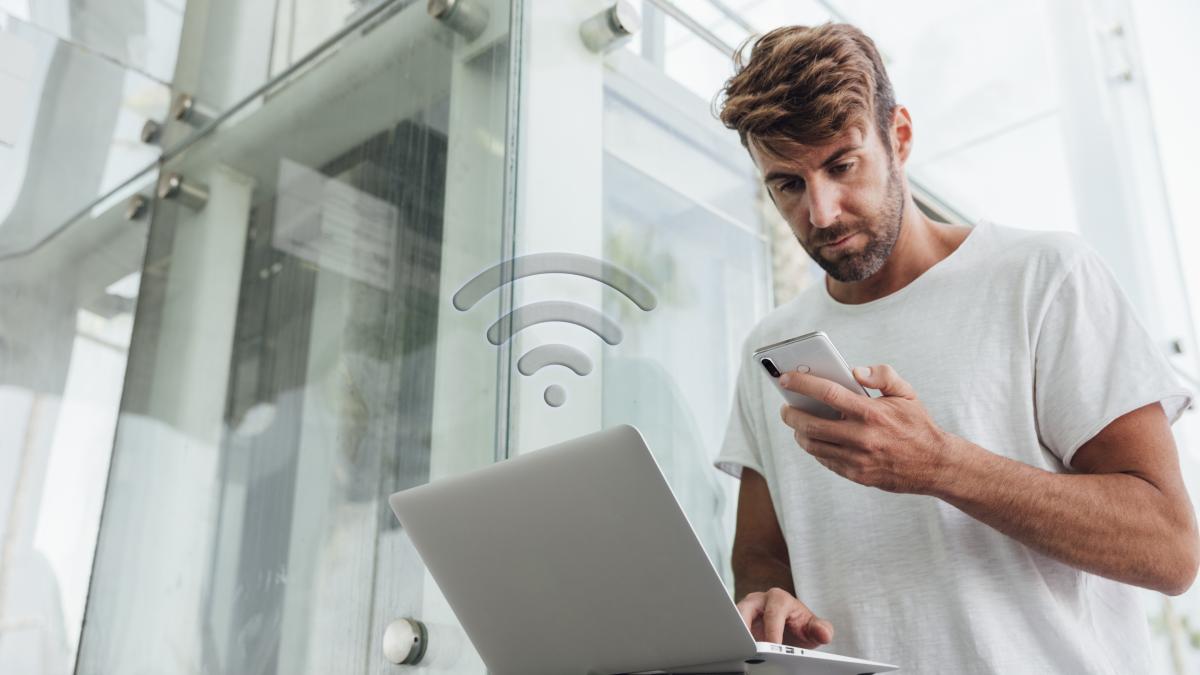 bearded-man-checking-portable-devices_58042500