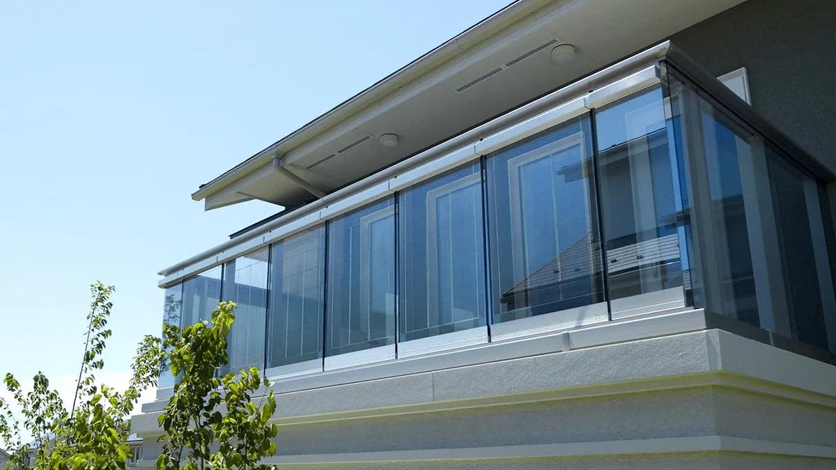 a-window-covered-balcony-of-a-house_47136400