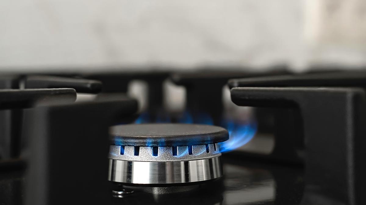 modern-kitchen-stove-natural-gas-burns-with-blue-flame-household-gas-consumption-close-up-selective-focus_49945200