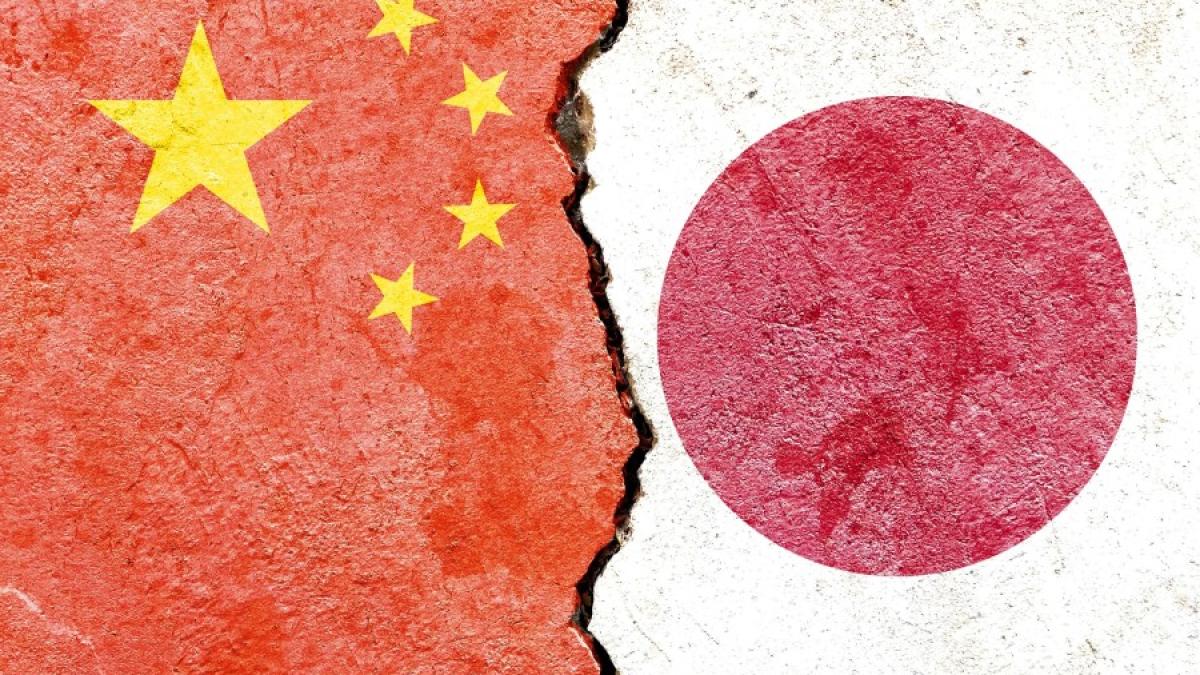 view-south-korea-vs-japan-national-flags-isolated-broken-cracked-concrete-wall-background-1_57854700