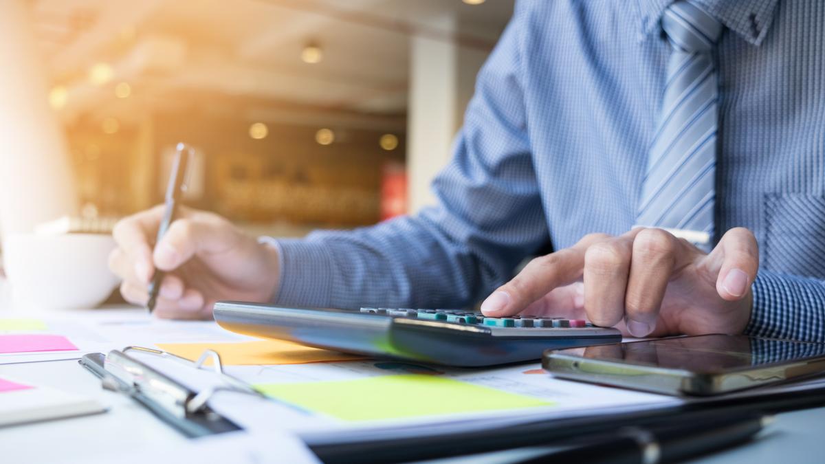 business-finance-man-calculating-budget-numbers-invoices-financial-adviser-working_91427300