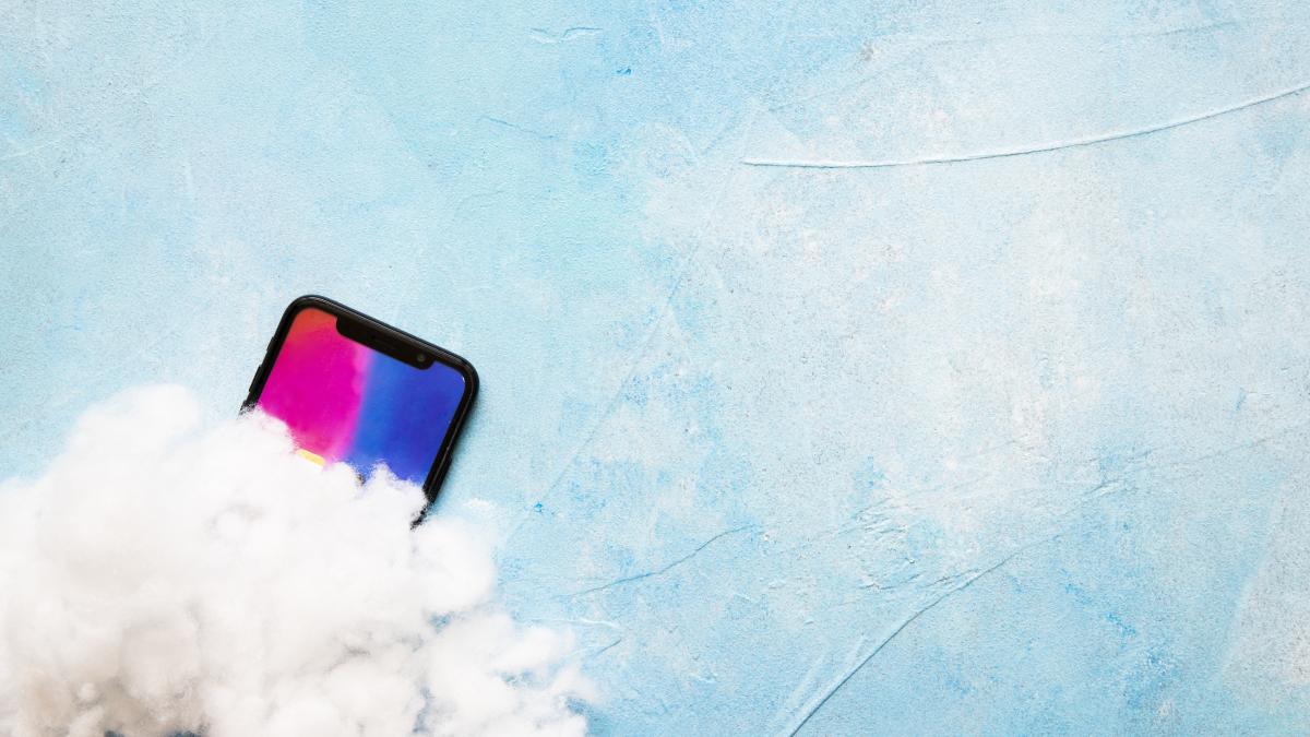 cotton-wool-mobile-phone-screen-painted-blue-background_06755400