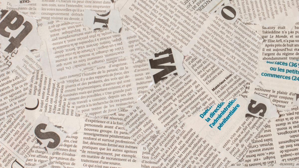 top-view-old-french-newspaper-pieces_97785600