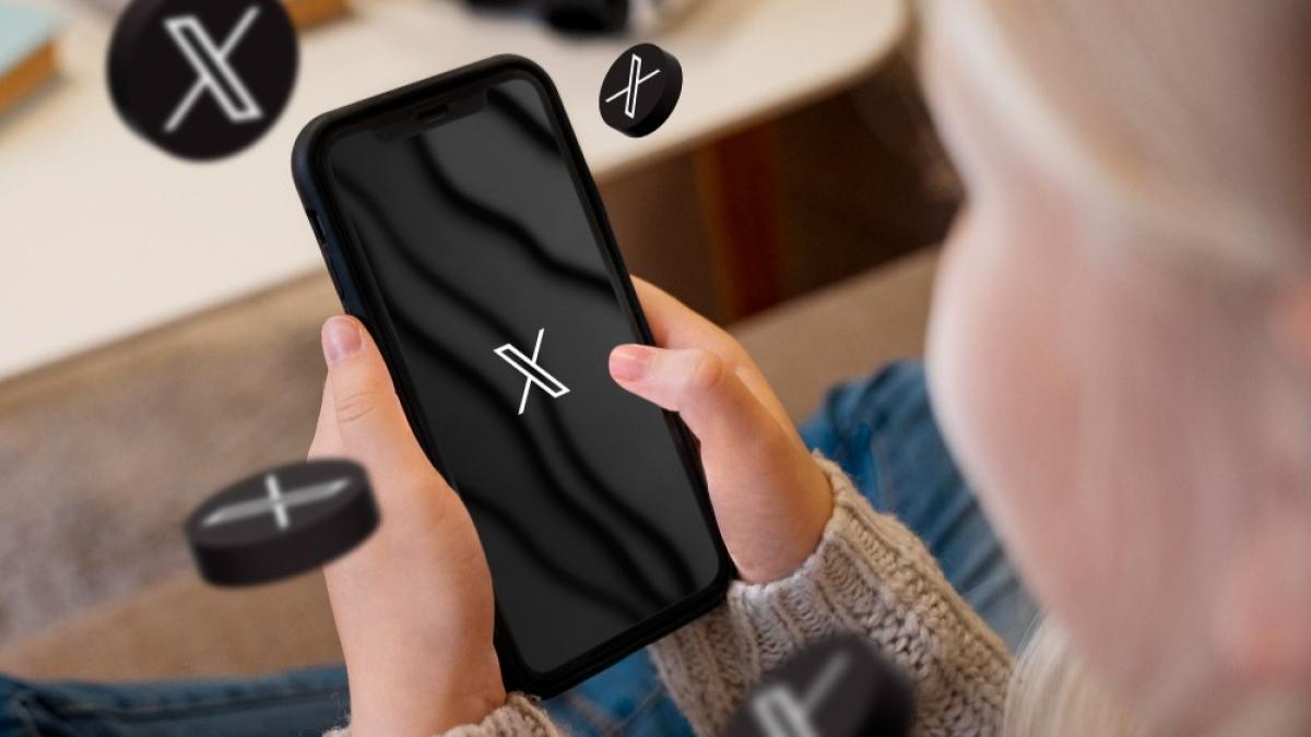 high-angle-person-holding-smartphone-using-new-social-media-application_85572100