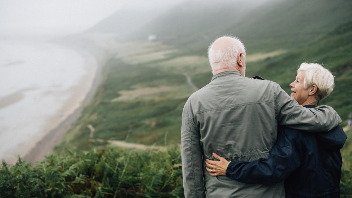 happy-senior-couple-enjoying-breathtaking-view_53407300