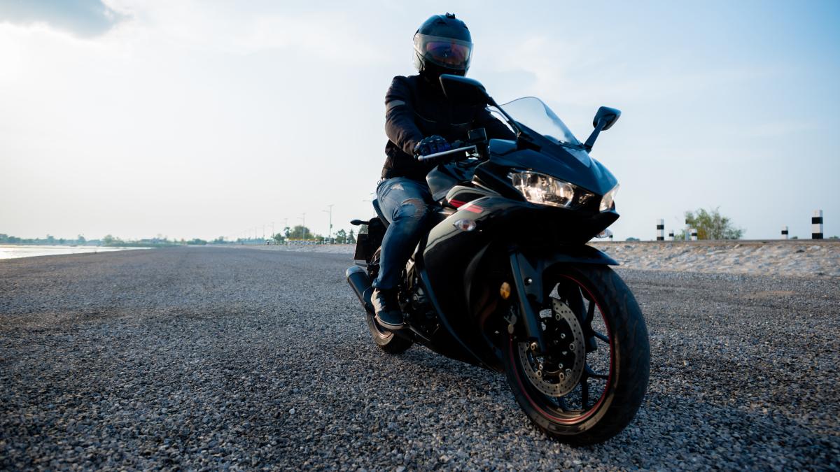 rider-motorbike-road-riding-having-fun-driving-empty-road_29495400