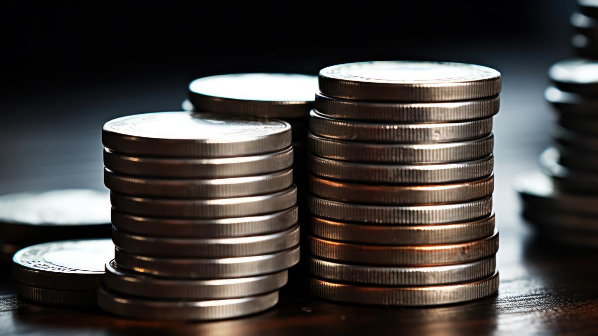 closeup-stacked-silver-coins-showcasing-detailed-edges-textures_20612800