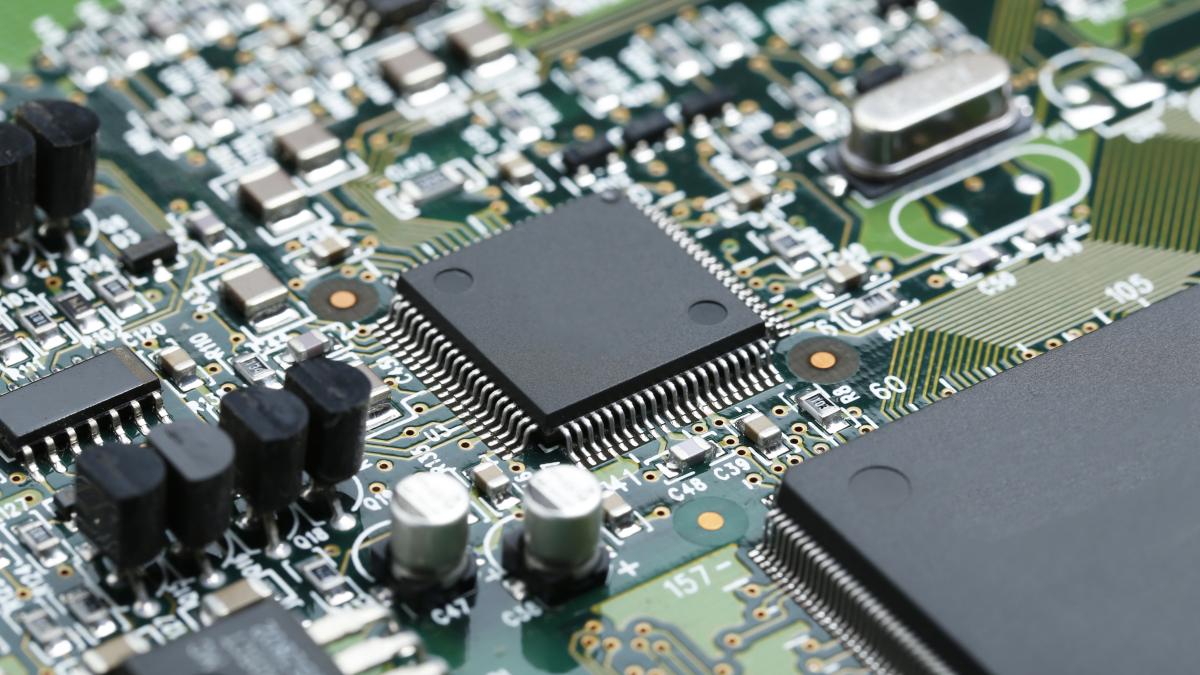 closeup-electronic-circuit-board-with-cpu-microchip-electronic-components-background-1_79196000
