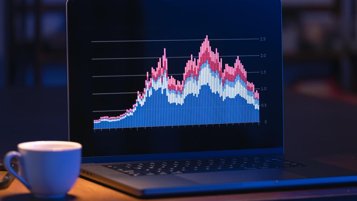 computer-dark-room-with-graphs-screen_24289500