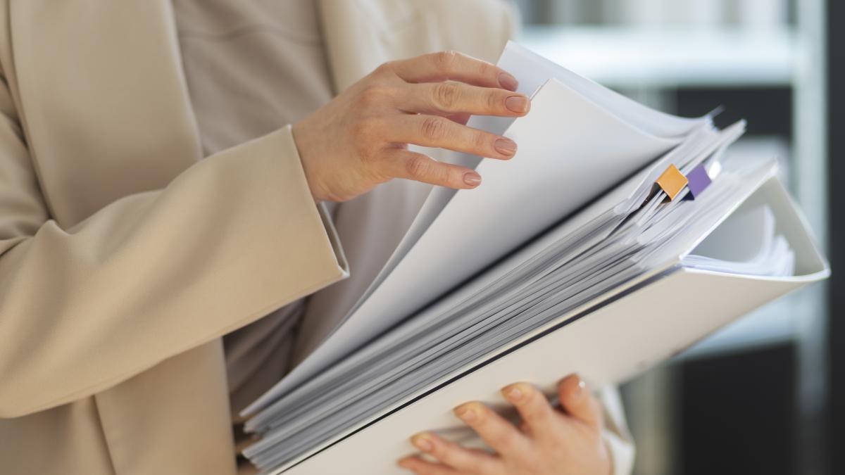 young-adult-organizing-documents-1_31478000