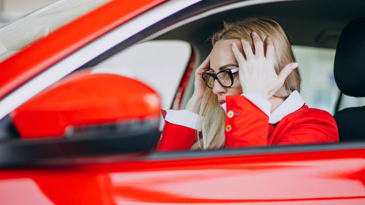 business-woman-sitting-new-car-car-showroom_48648700