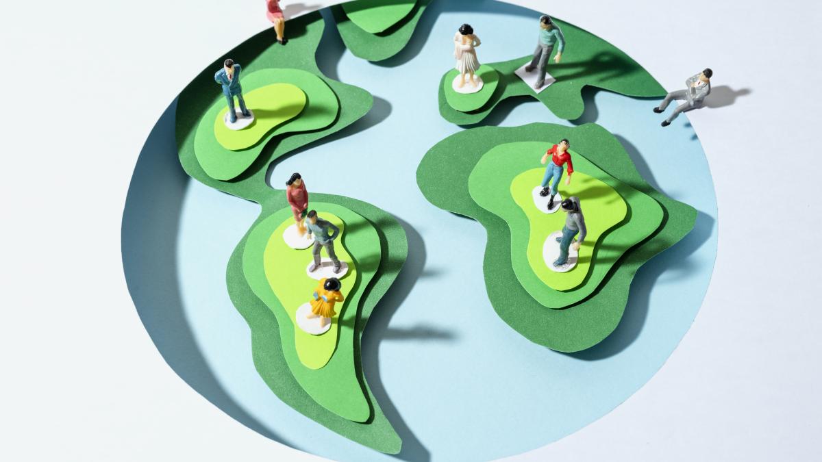 paper-style-earth-globe-with-silhouettes_77869500