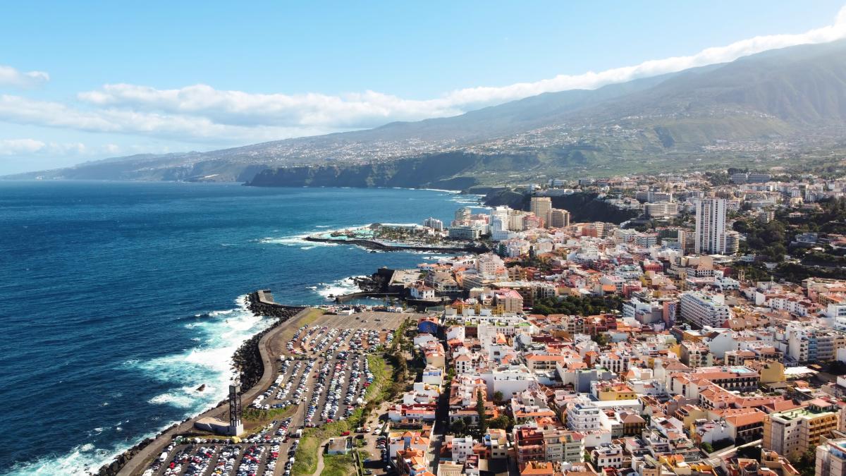 aerial-drone-view-puerto-de-la-cruz-tenerife-canary-islands-multiple-residential-buildings_85664400