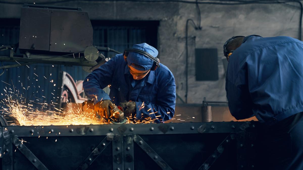 two-worker-making-gates-smithy_56491000