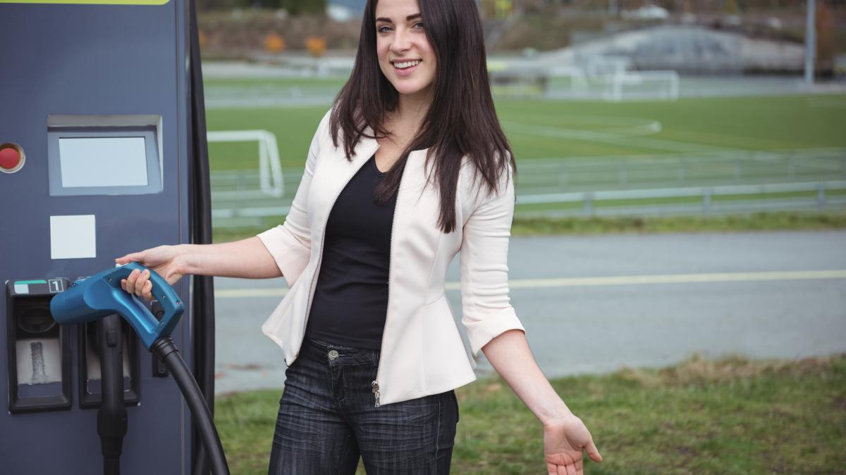 portrait-beautiful-woman-using-plug-electric-machine_78217900