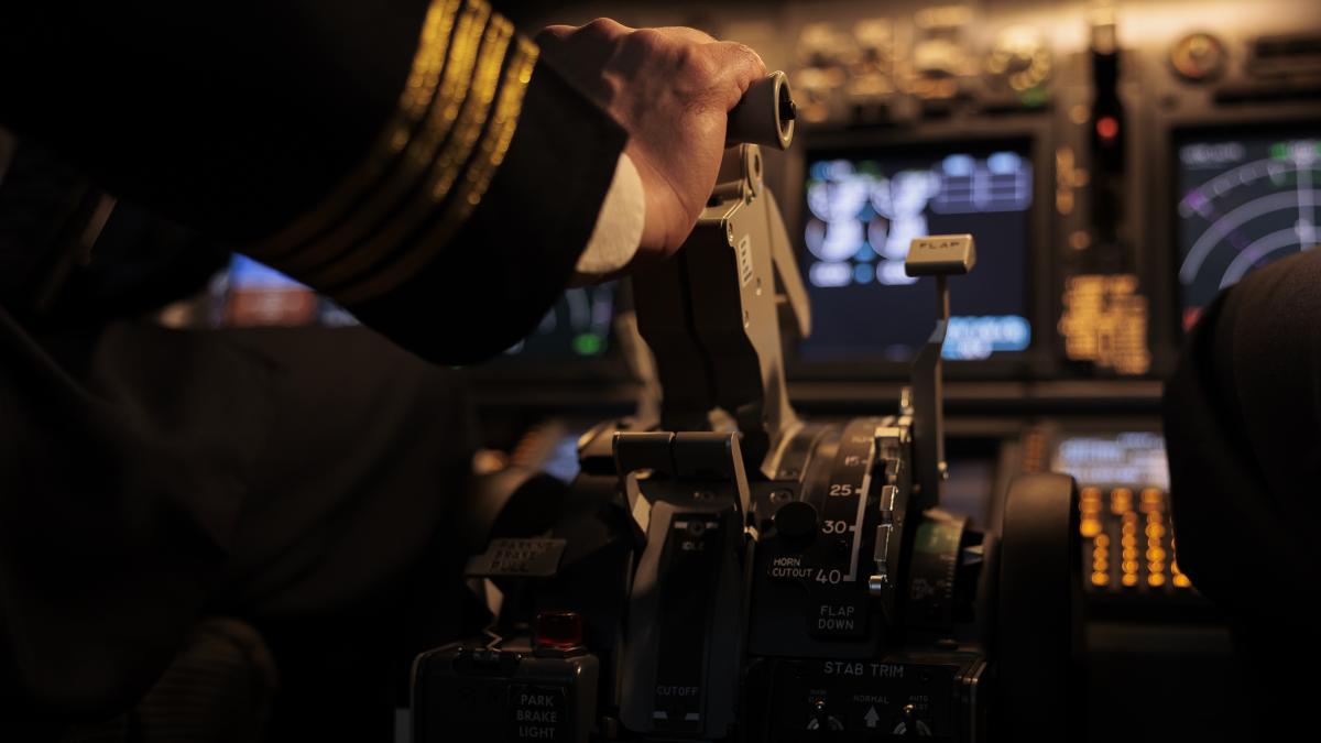 airplane-captain-throttling-engine-takeoff-fly-jet-cockpit-flying-plane-using-dashboard-command-control-panel-buttons-looking-windscreen-radar-compass-taking-off-close-up_27453800