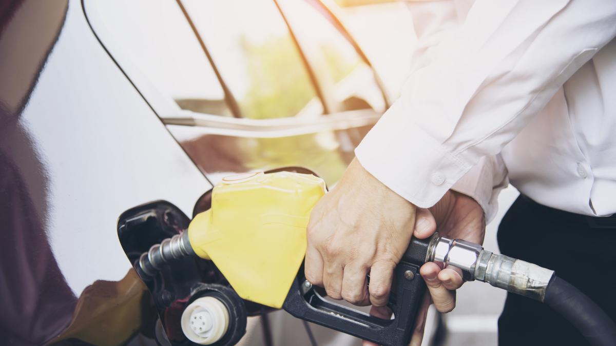 man-putting-gasoline-fuel-into-his-car-pump-gas-station-7_95934400