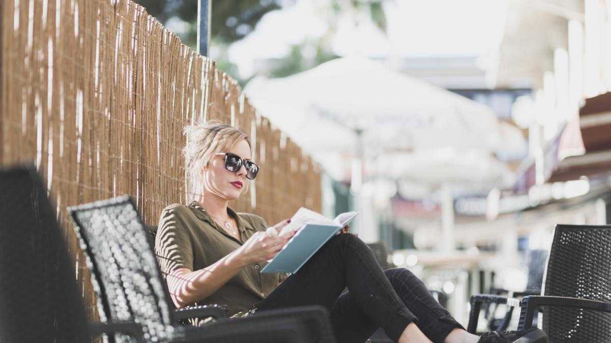 woman-enjoying-book-vacation_46884500