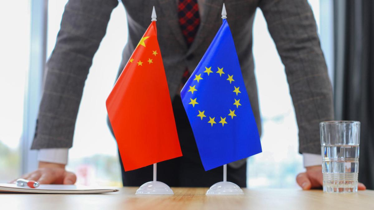 chinese-flag-flag-european-union-with-businessman-near-by_58284100