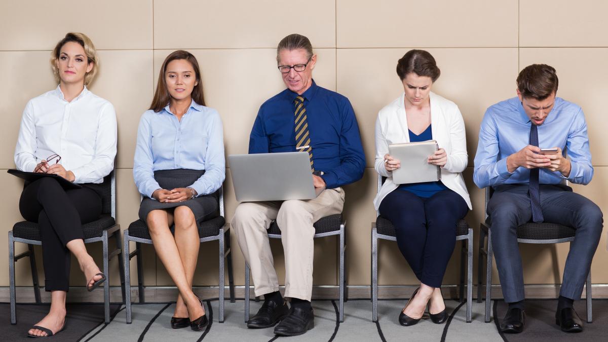 five-male-female-applicants-waiting-room_72214700