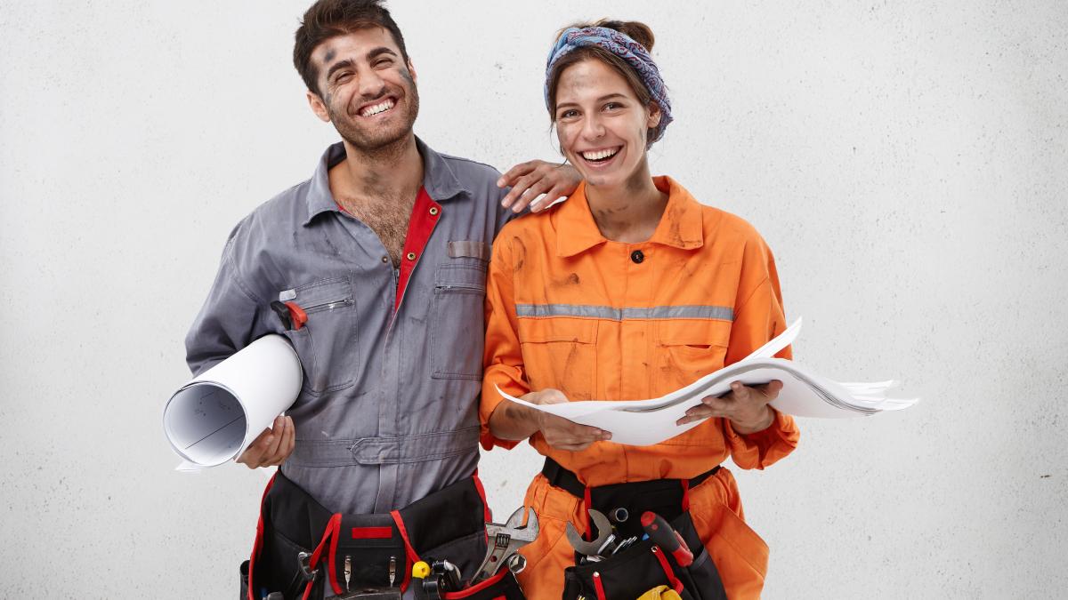 female-male-workers-wearing-work-clothes_95673400