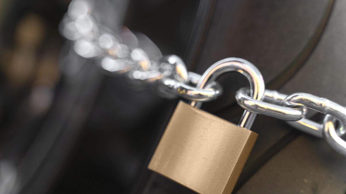 close-up-man-preparing-steal-motorcycle_22565200
