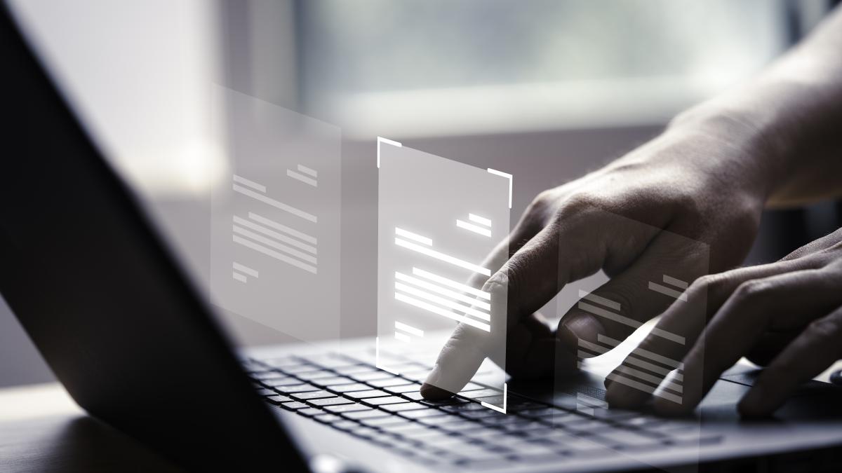 hand-using-laptop-computer-with-virtual-screen-document-online-approve-paperless-quality-assurance-erp-management-concept-1_43872300