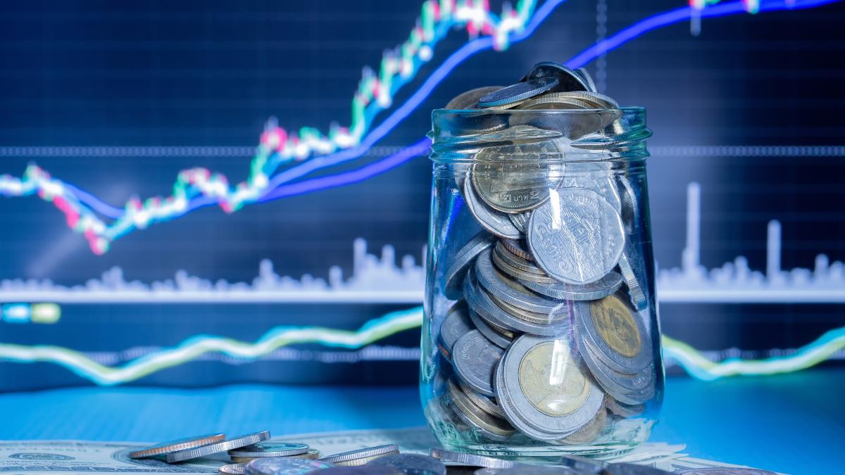 coins-bottles-with-trading-graph-1_98902000