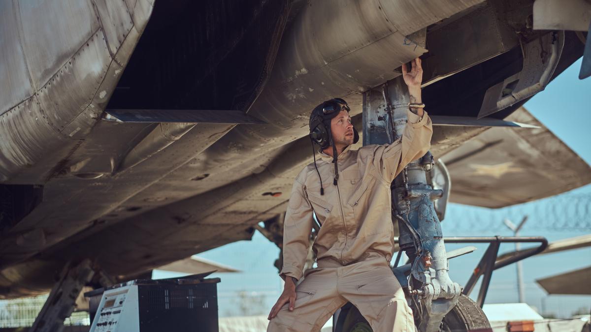 mechanic-uniform-flight-helmet-carries-out-maintenance-war-fighter-interceptor-open-air-museum_72723600