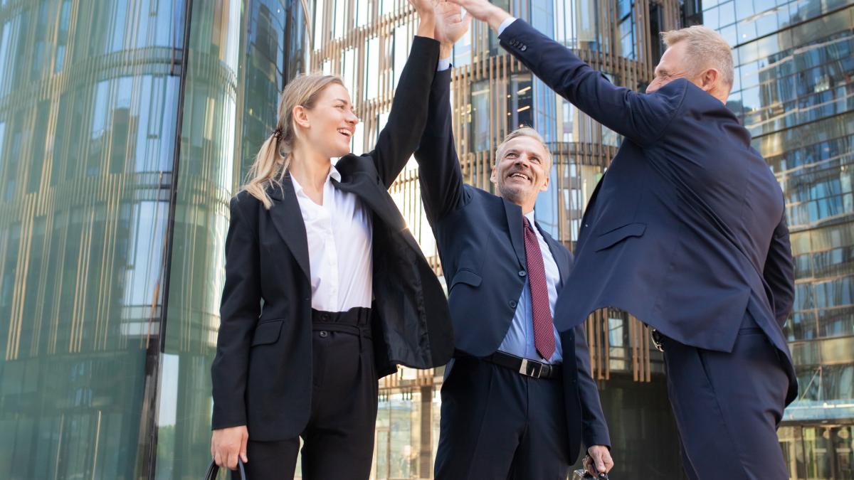 three-cheerful-businesspeople-giving-five-smiling-confident-happy-colleagues-celebrating-successful-deal-together-standing-outdoors-rising-hand-up-teamwork-partnership-concept_96726900