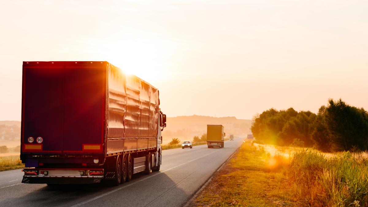 arriving-truck-road-rural-landscape-sunset_34763600