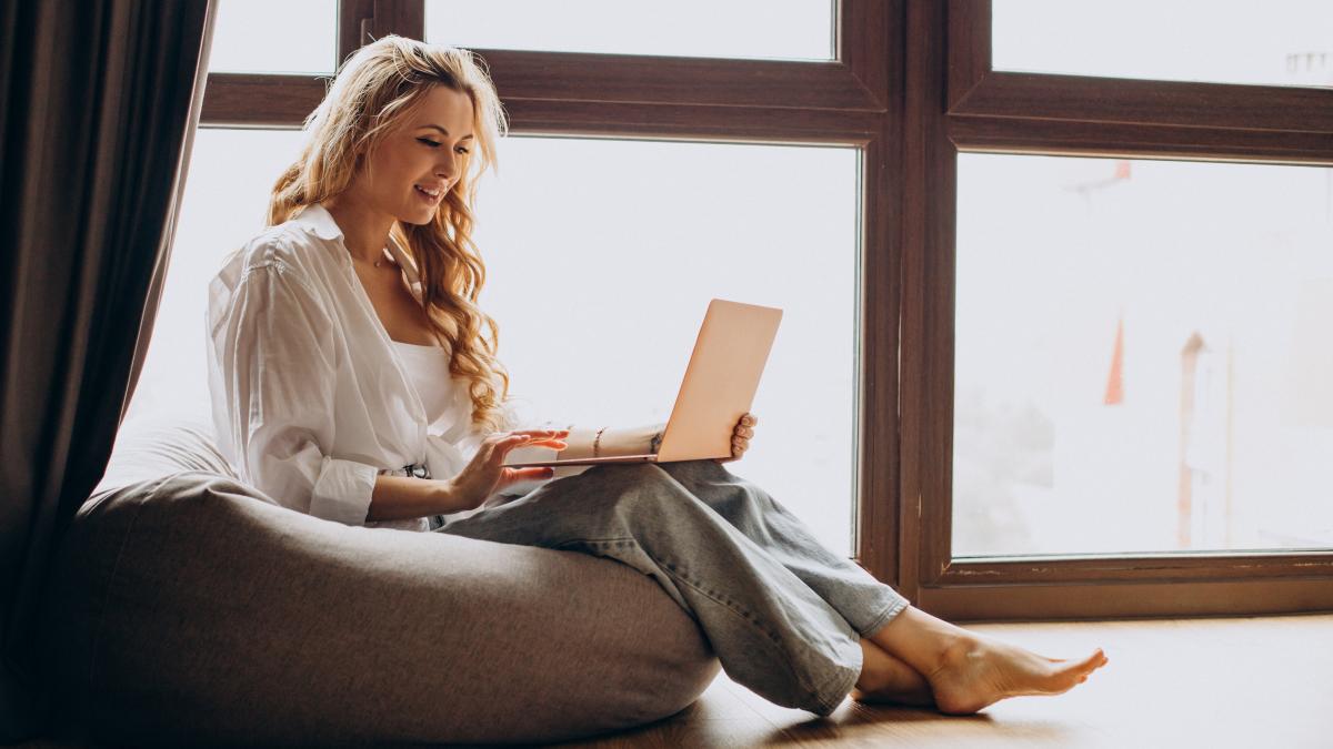woman-working-from-home-laptop_11101600