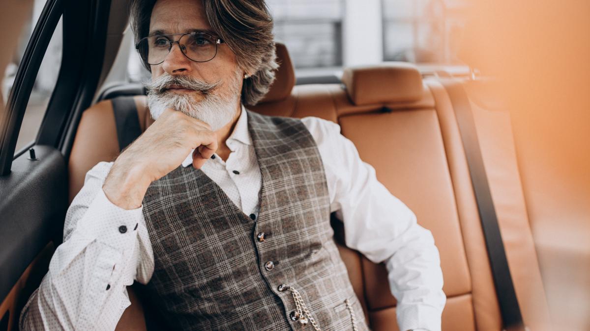 business-man-sitting-his-car-back-sit_71307500