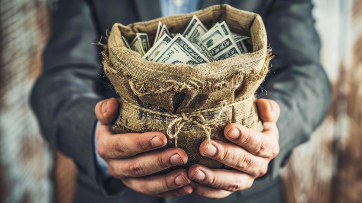 view-man-handling-money-funds-wealth-prosperity_26000900