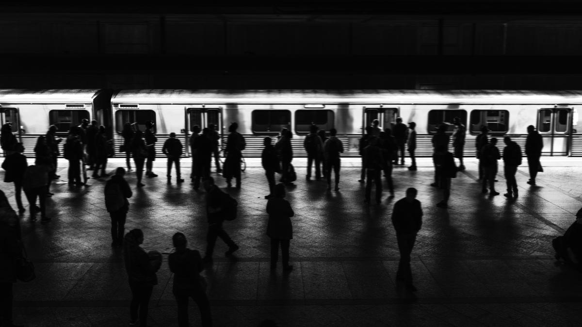 people-waiting-train-platform_10477200