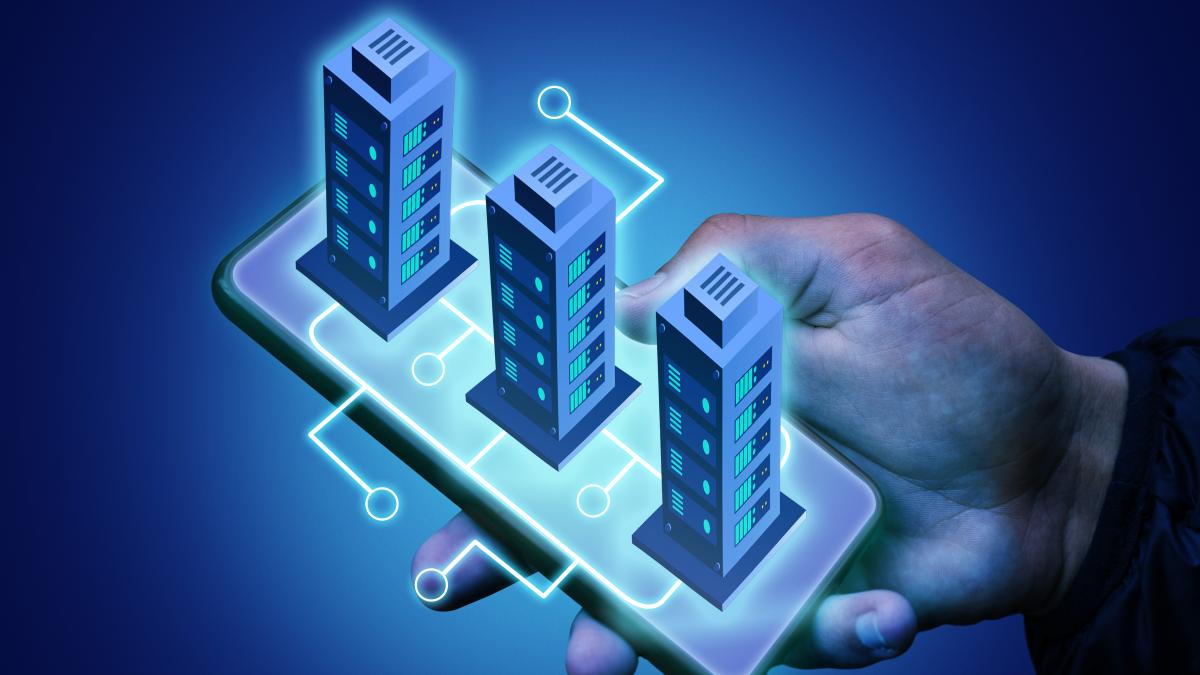 man-holding-smartphone-with-apartment-buildings-hologram_71902700