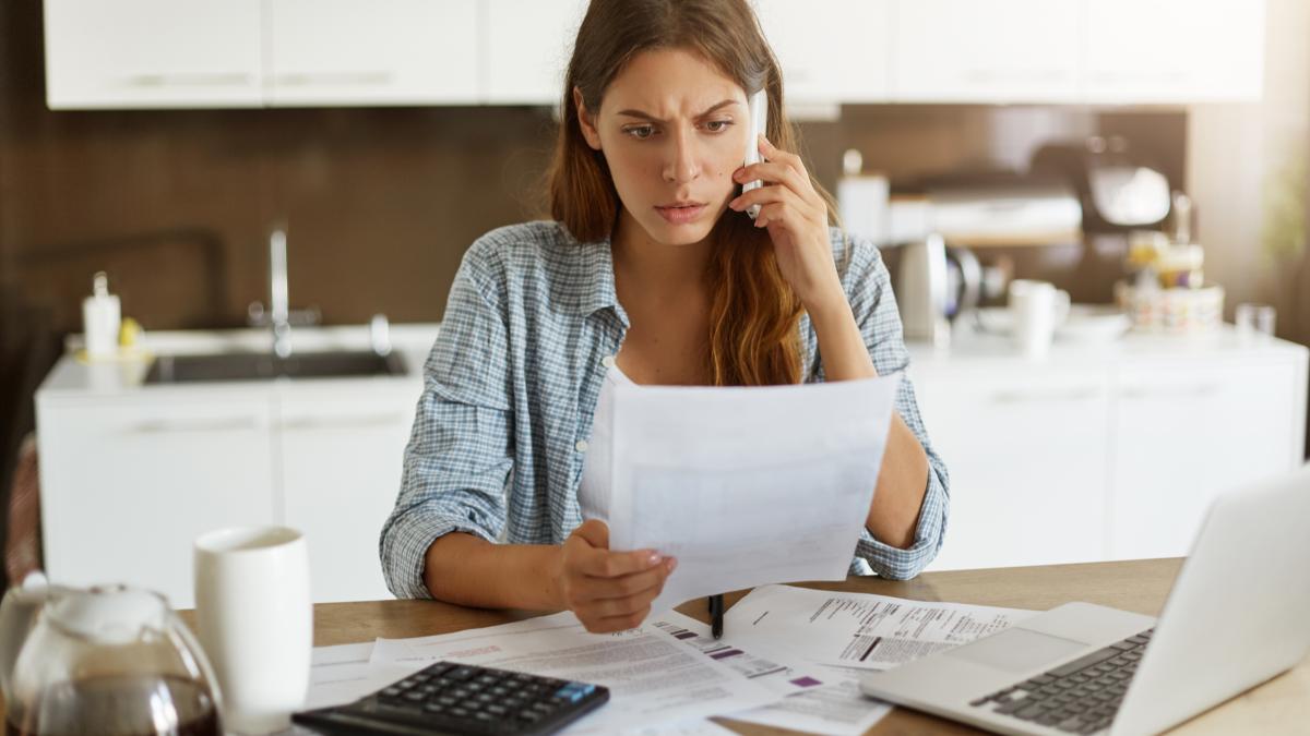 young-woman-checking-her-budget-doing-taxes_85865000