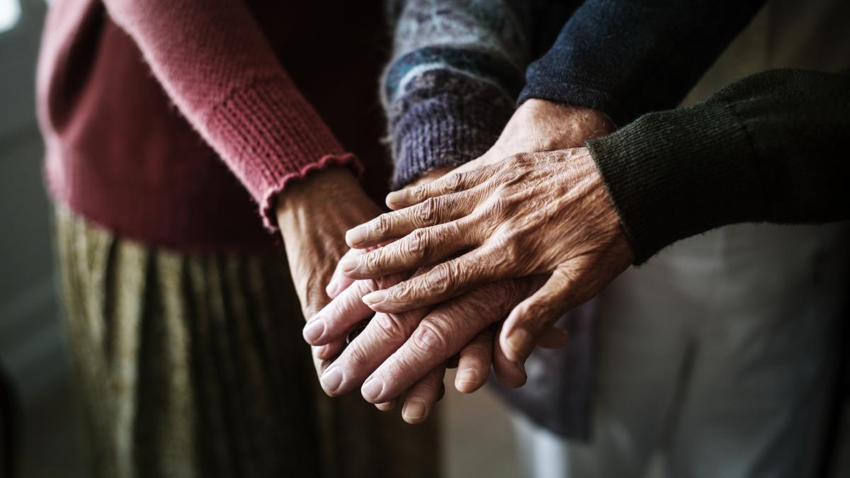 closeup-hands-group-seniors_11368300