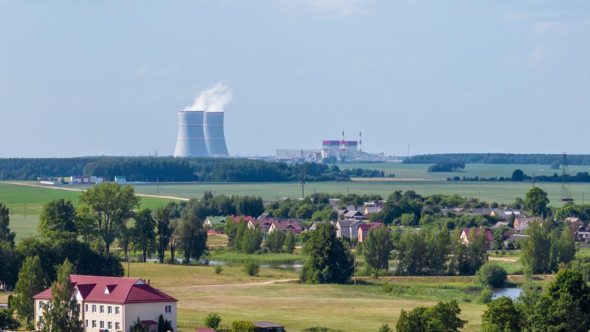 cooling-towers-nuclear-power-plant-against-blue-sky_23967200