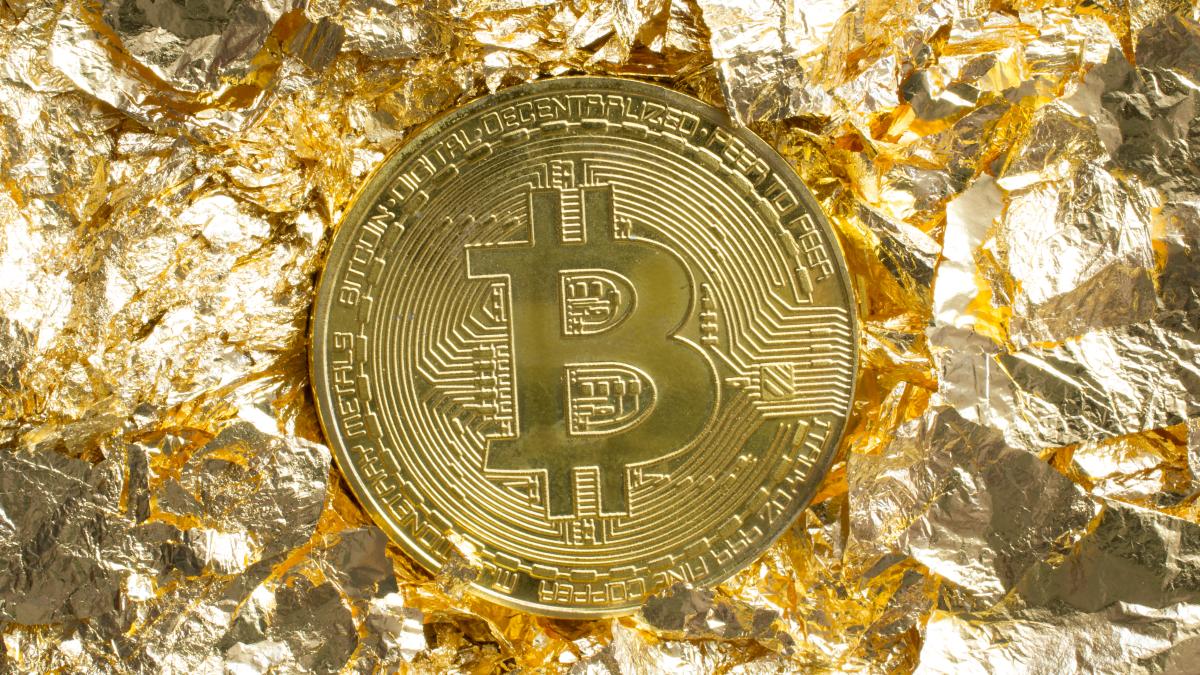 bitcoin-coin-golden-foil-pieces-around-decorative-background_96493600