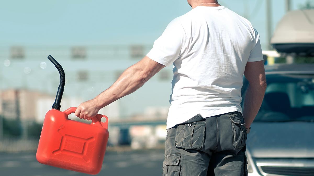 rear-view-man-standing-road_62815800