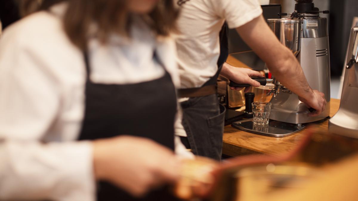 coffee-shop-employees-working-coffee-machines