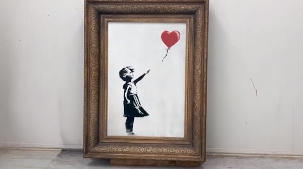 Farsa lui Banksy s-a terminat greșit. Tabloul trebuia să fie tocat tot VIDEO