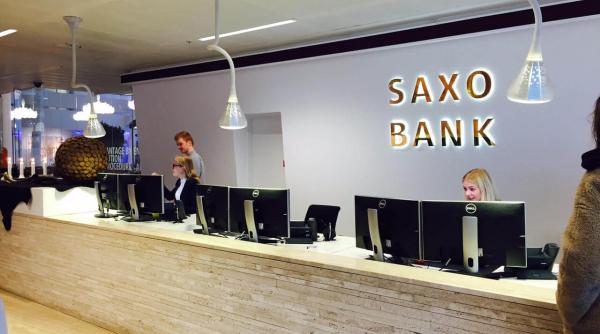 Tranzacționarea EURRON și USDRON, introdusă de Saxo Bank